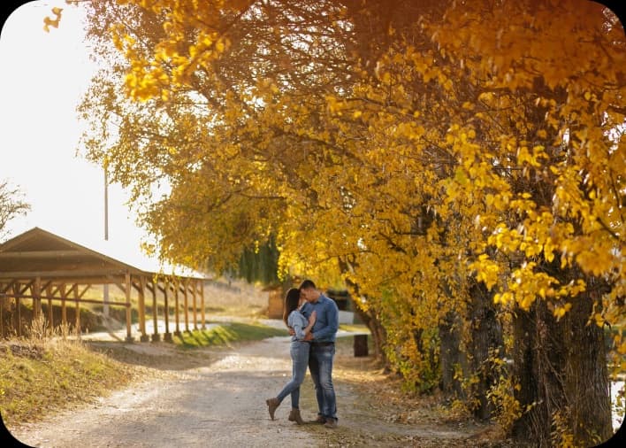 Couple walking in autumn park